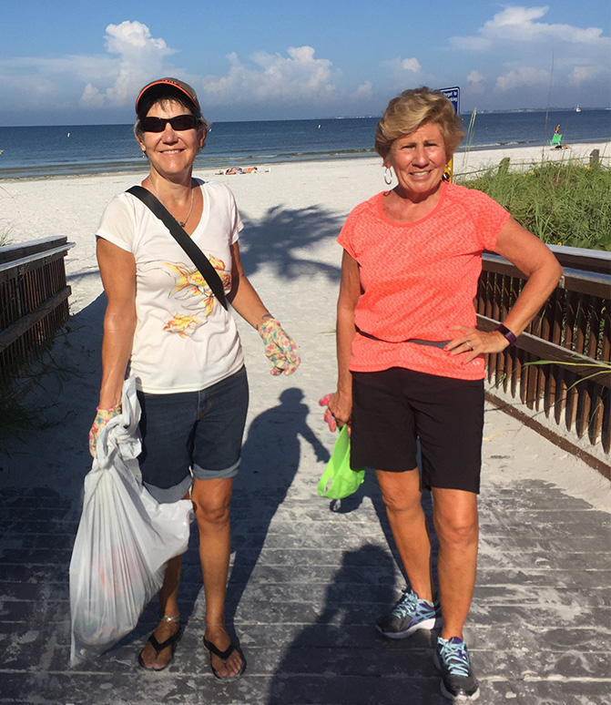 beach clean up two members of fort myers beach community foundation